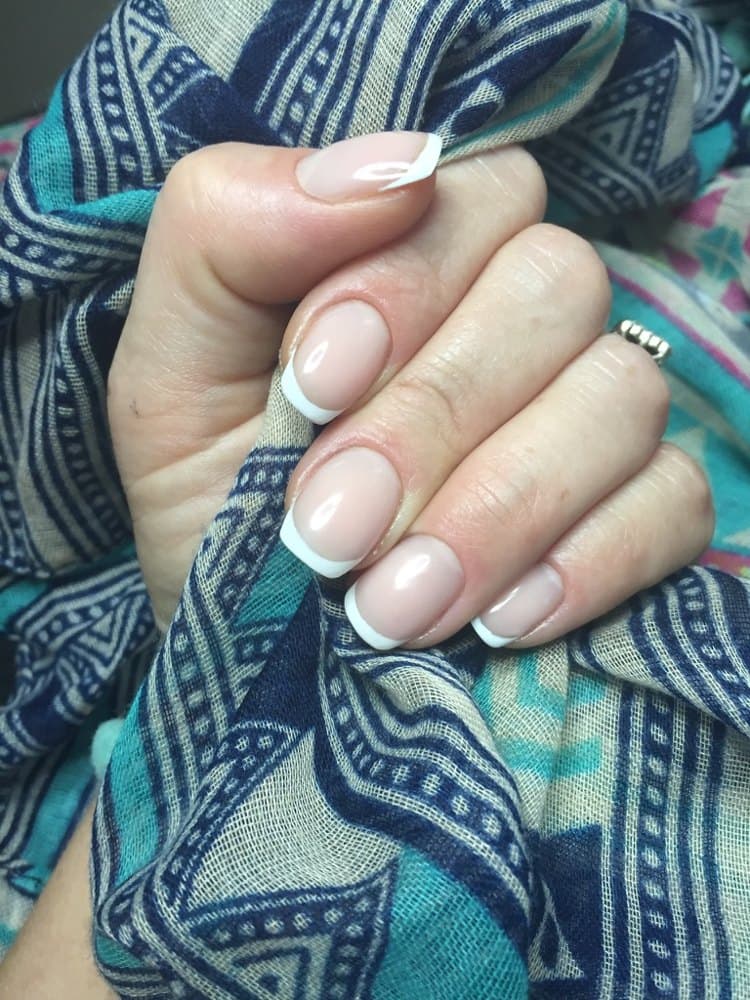 Natural nude BIAB nails with a glossy finish at Nata Beauty